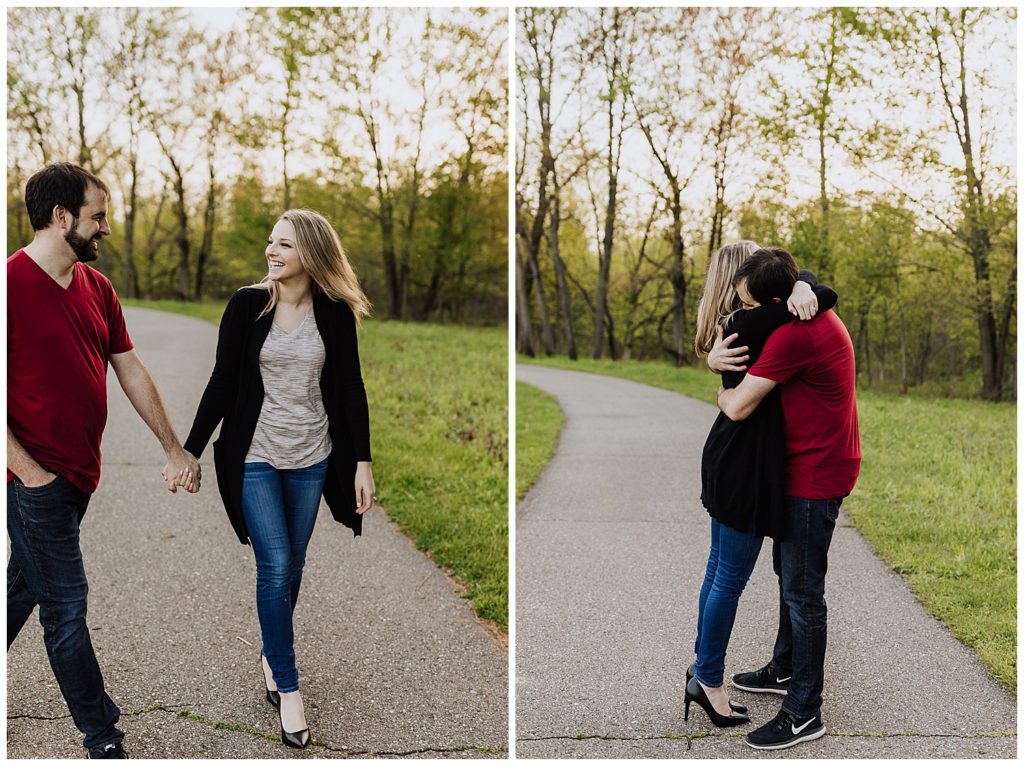 couple pose walking and holding hands hugging 
