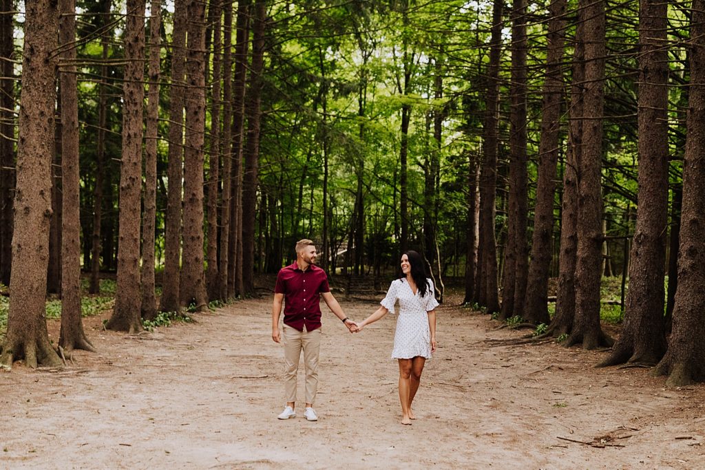 couple walking while holding hands