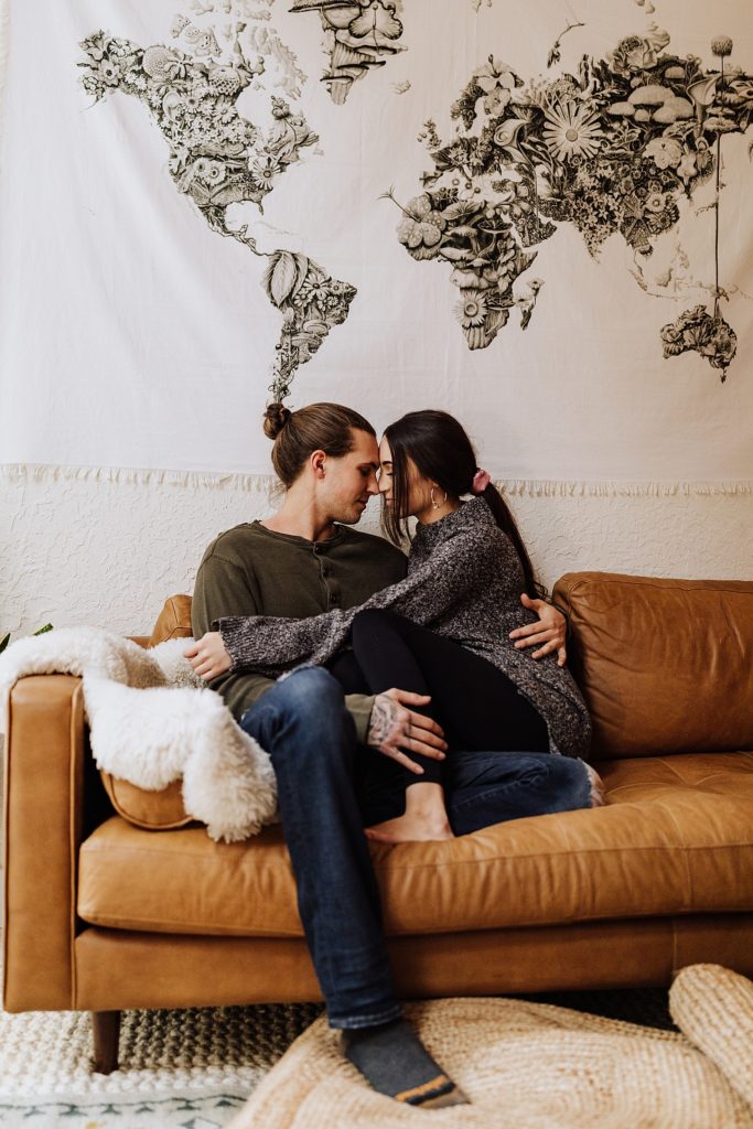 oregon couple cuddling on couch