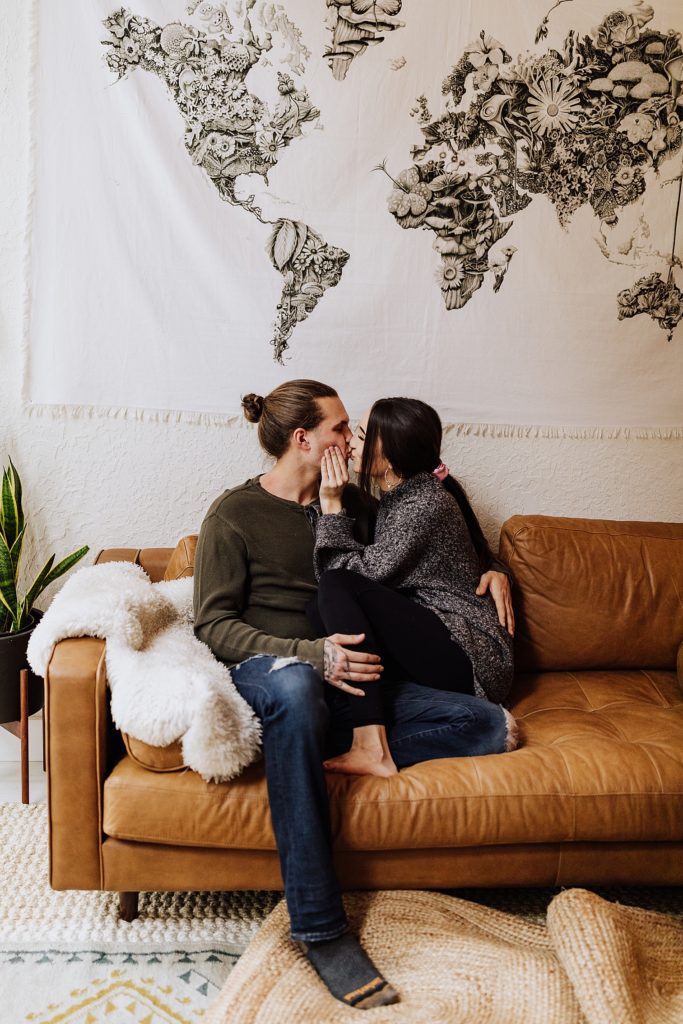 oregon couple kissing on couch