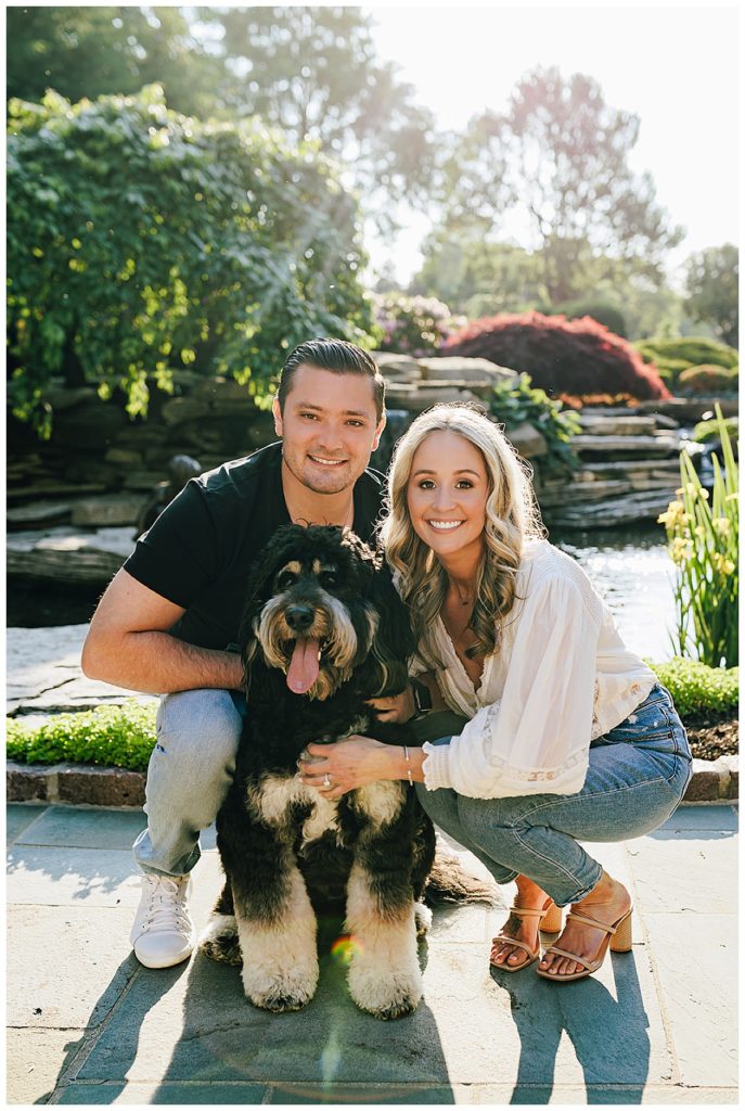 Dog, man and woman smiling by Kayla Bouren Photography.