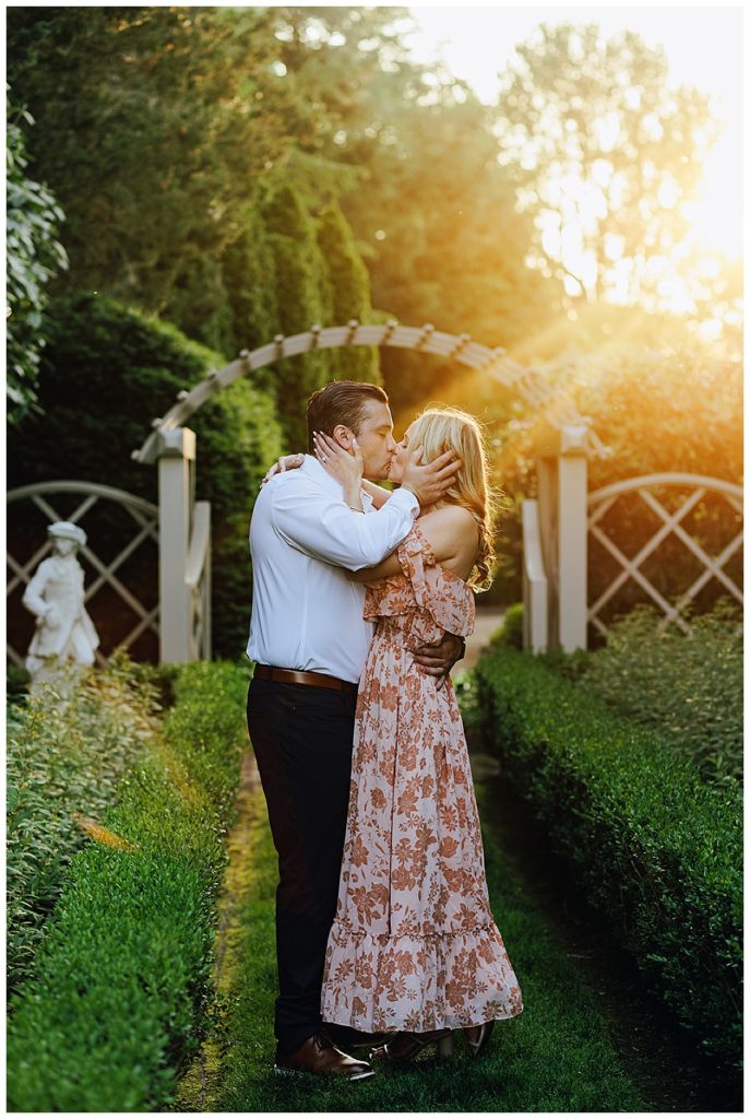 Couples kisses under sun by Detroit Wedding Photographer
