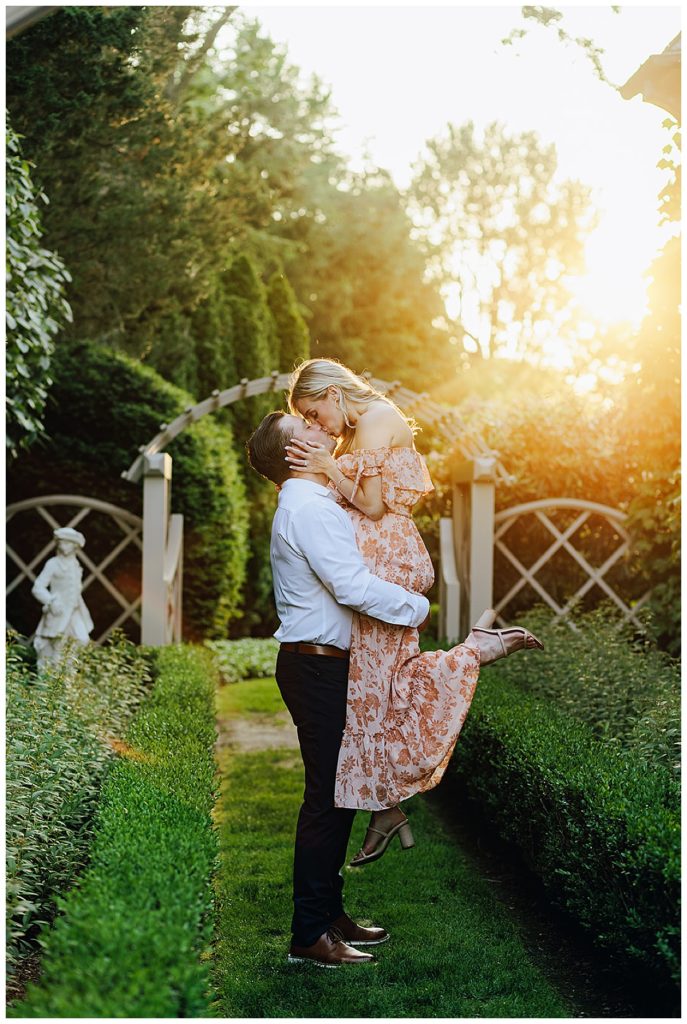 Sun is setting as couple share passionate kiss by Kayla Bouren Photography.