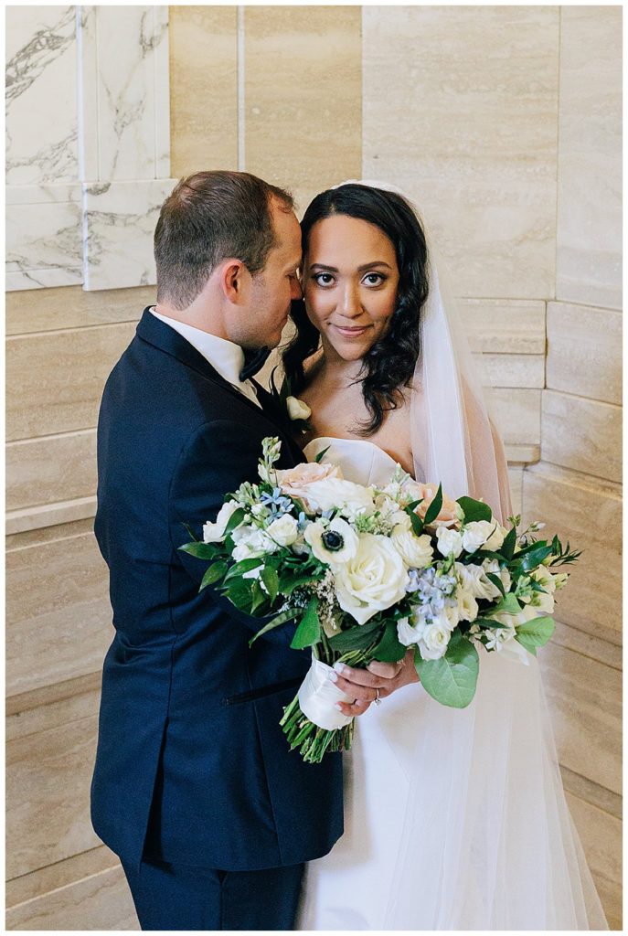 Bride and groom spending moment together for elegant Detroit Yacht Club wedding.