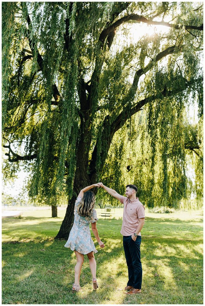 Couple dances beneath willow tree for Kayla Bouren Photography