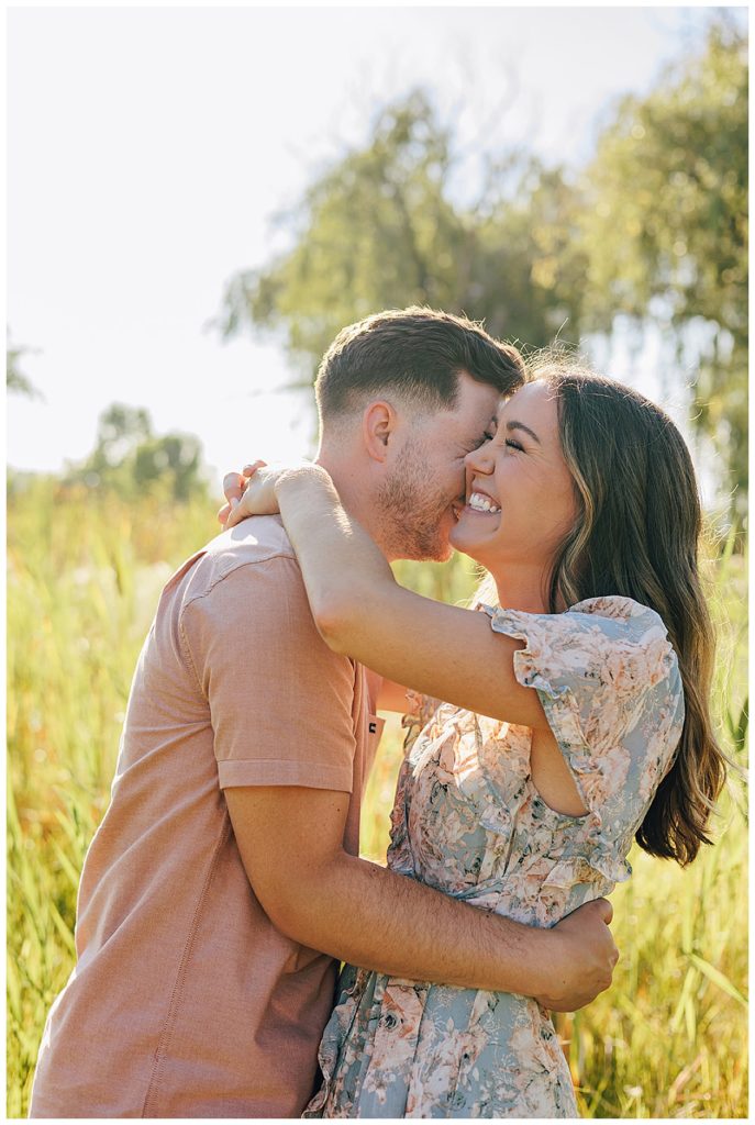Couple laugh together for Kayla Bouren Photography