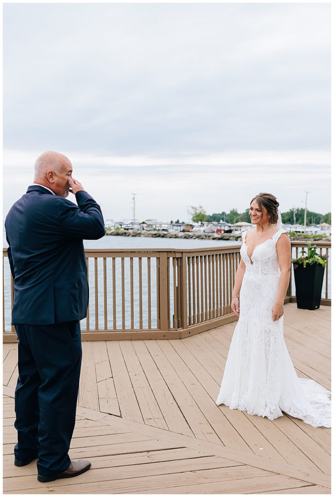 Father sees bride for a first look during Lake St. Clair wedding