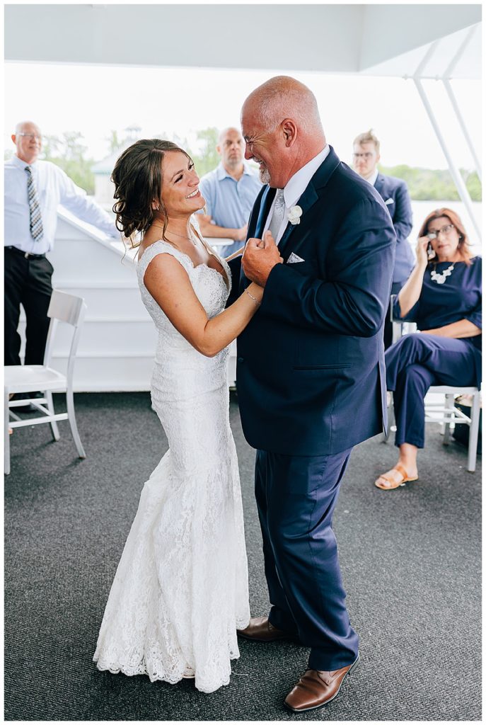 Father and daughter dance by Detroit wedding photographer