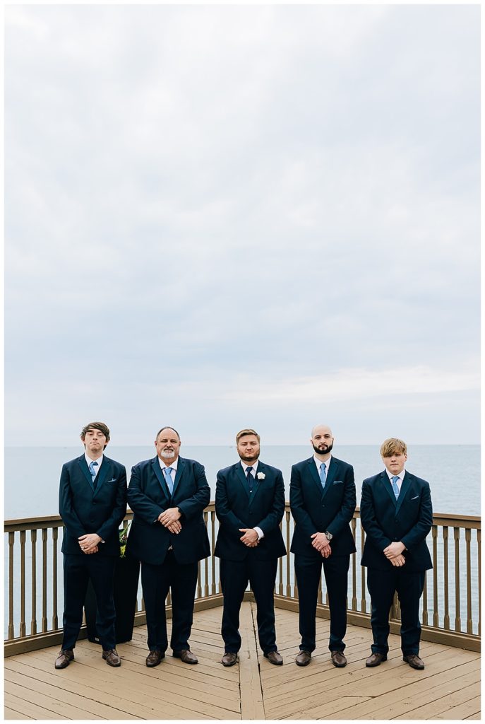 Groom with groomsmen by Detroit wedding photographer