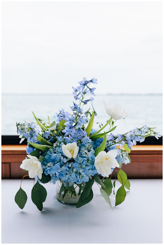 Beautiful blue floral arrangement by Kayla Bouren Photography.