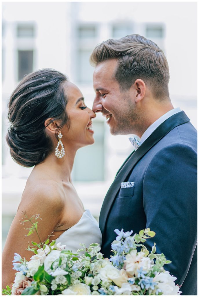 Nose to nose and smiling by Detroit Wedding Photographer