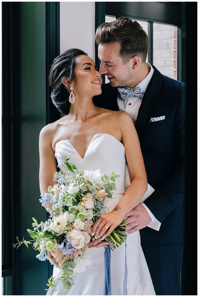 Bride and groom go nose-to-nose for Kayla Bouren Photography