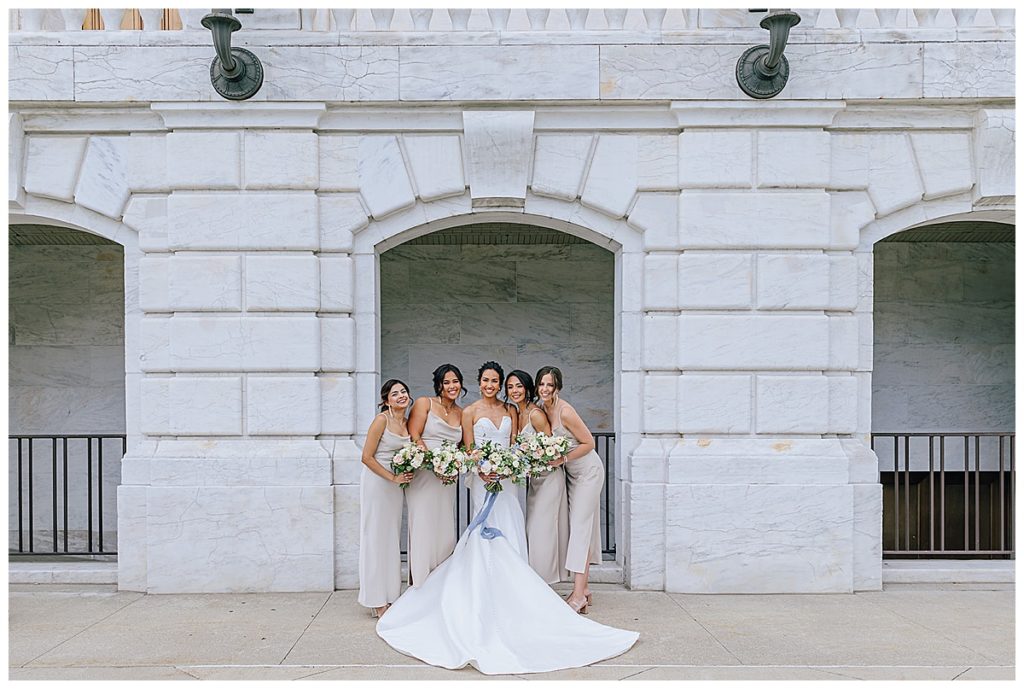Bride surrounded by wedding party for Chic Detroit Wedding