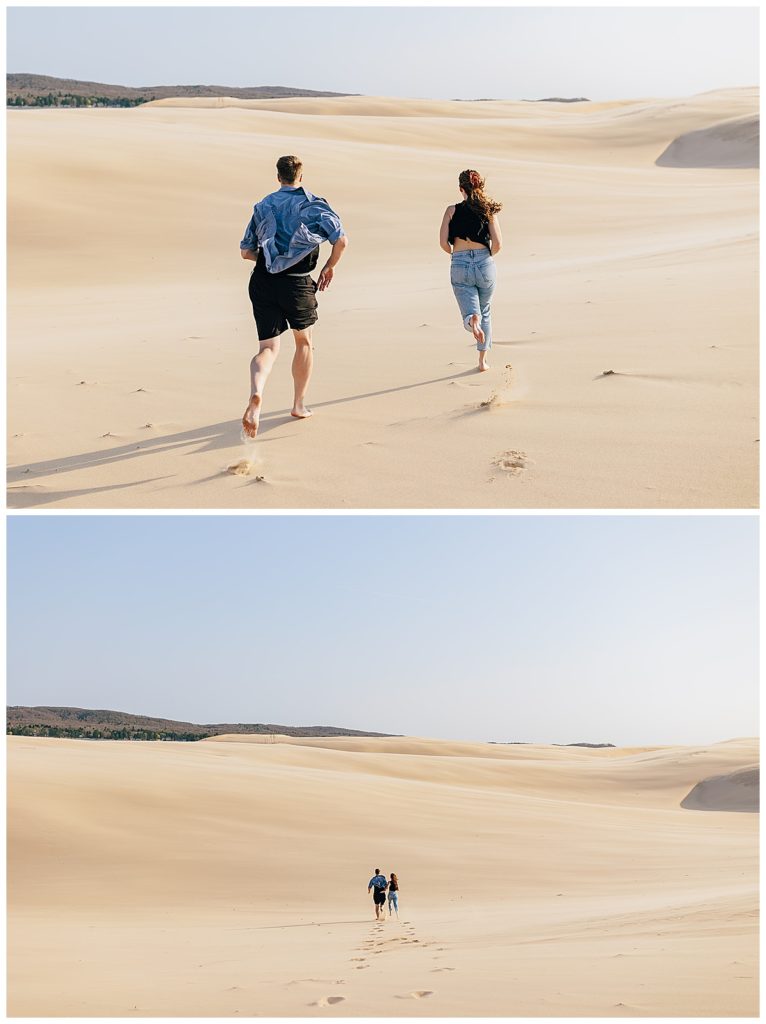 Couple runs in sand by Detroit Wedding Photographer