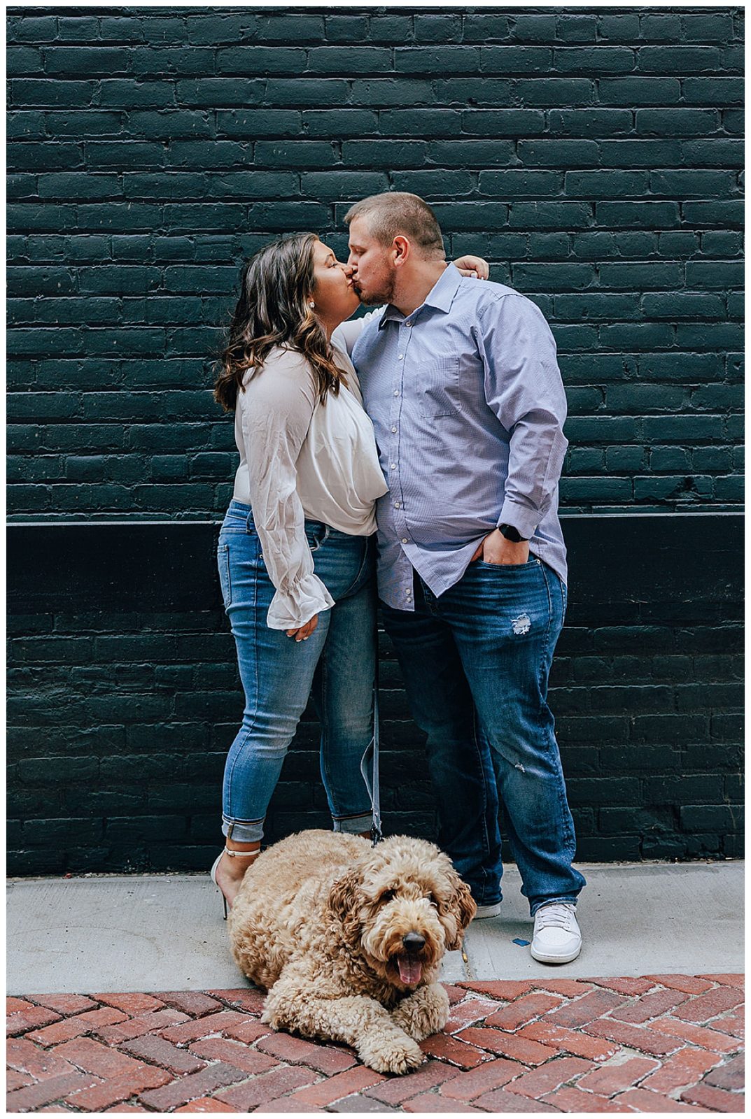 Dog parents kiss for Detroit Wedding Photographer