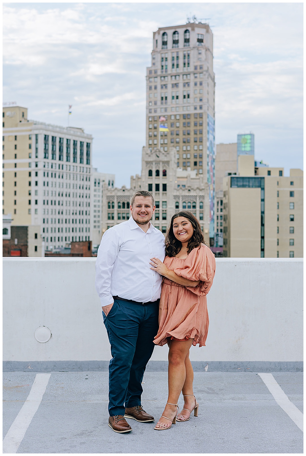 Woman holds hand on mans chest for Detroit Wedding Photographer