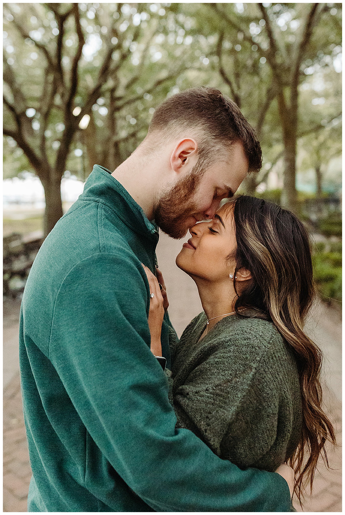 Couple touches foreheads by Kayla Bouren Photography