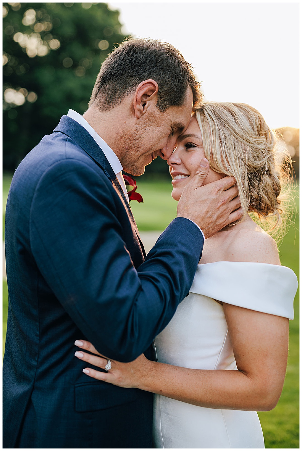 Bride and groom hold each other close for Kayla Bouren Photography
