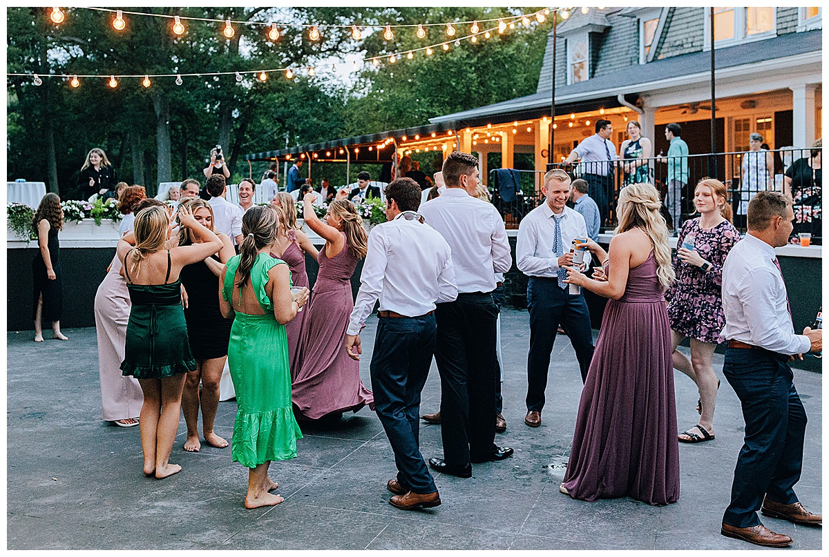 Friends and family dance the night away by Kayla Bouren Photography