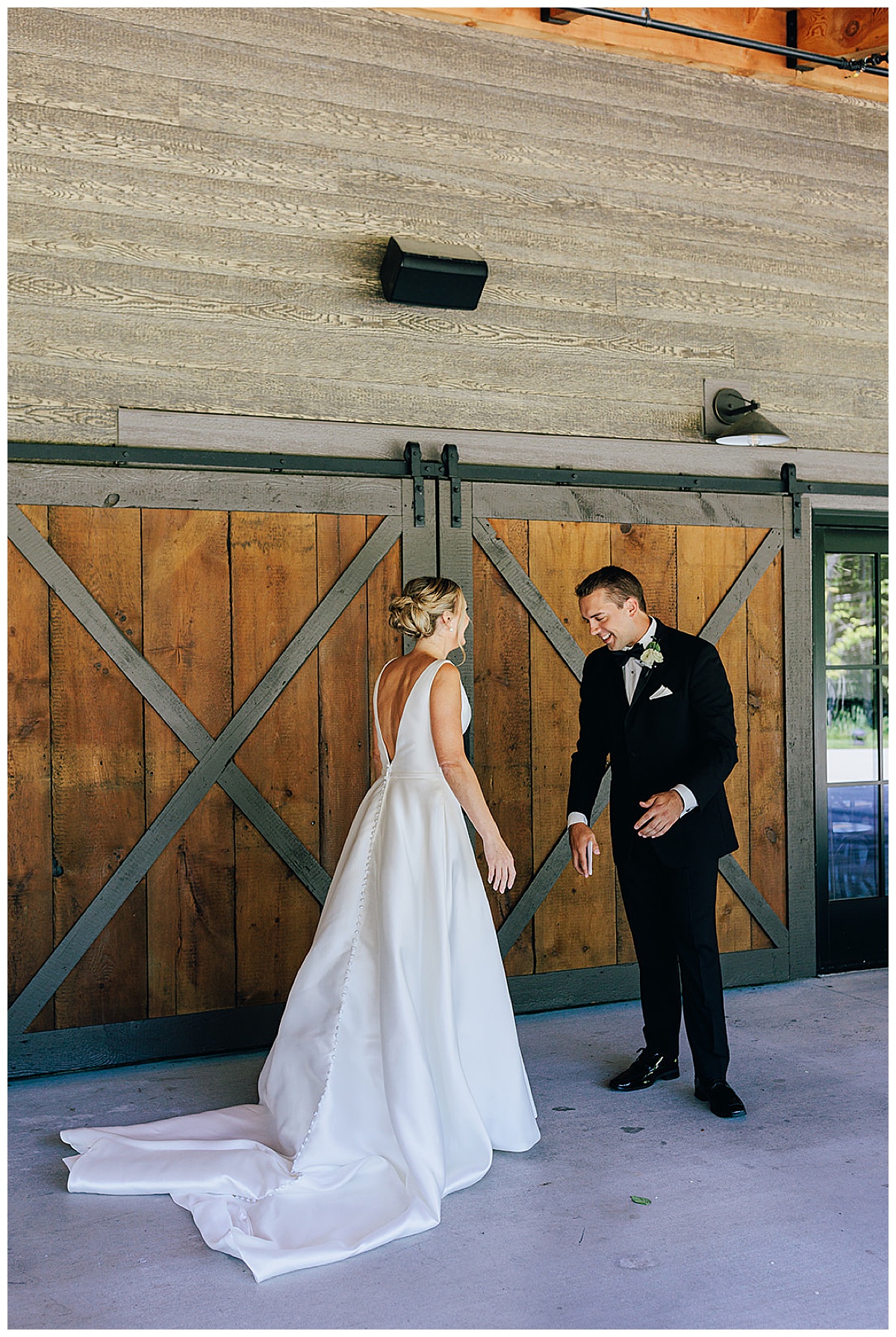 Groom sees bride for the first time at Black River Barn South Haven