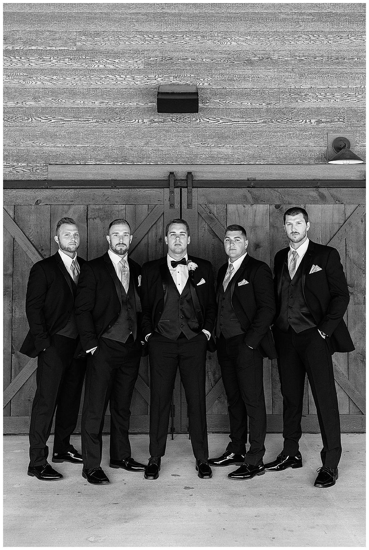 Serious faces by grooms friends for Kayla Bouren Photography