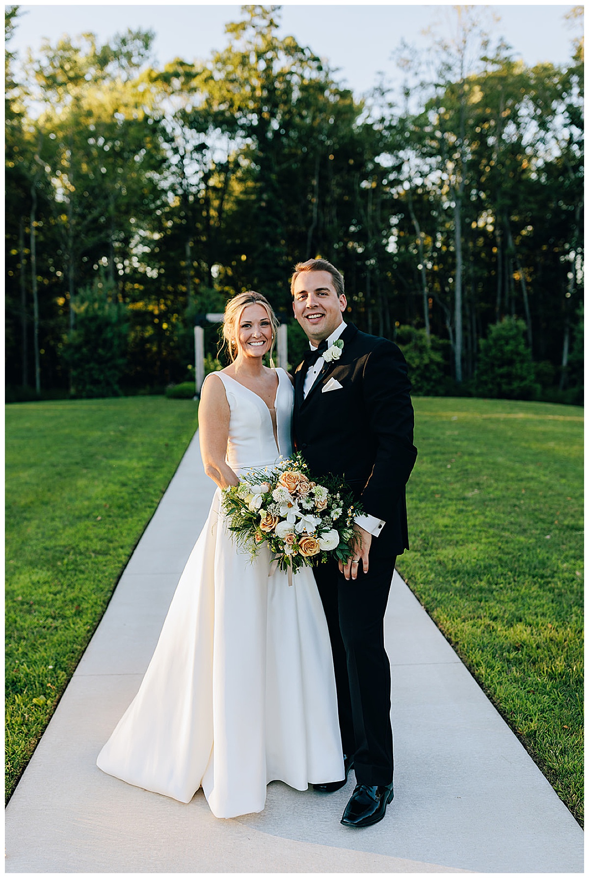 All smiles for bride and groom by Kayla Bouren Photography