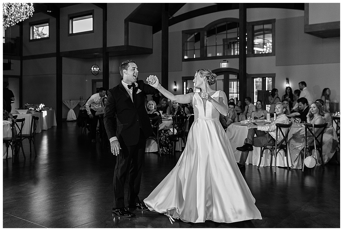 Couple enters dance floor by Detroit Wedding Photographer