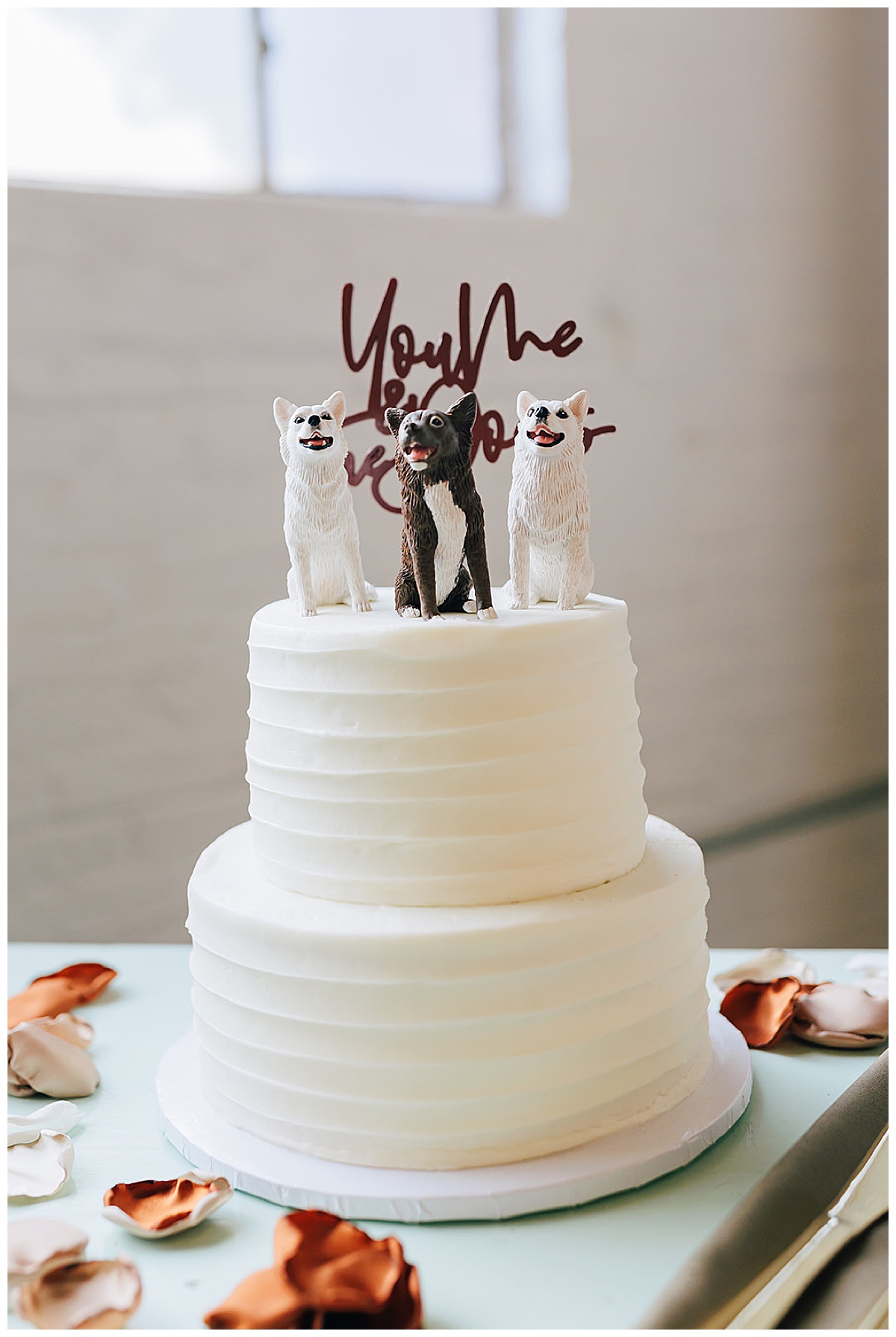 Cake topper with dogs by Detroit Wedding Photographer