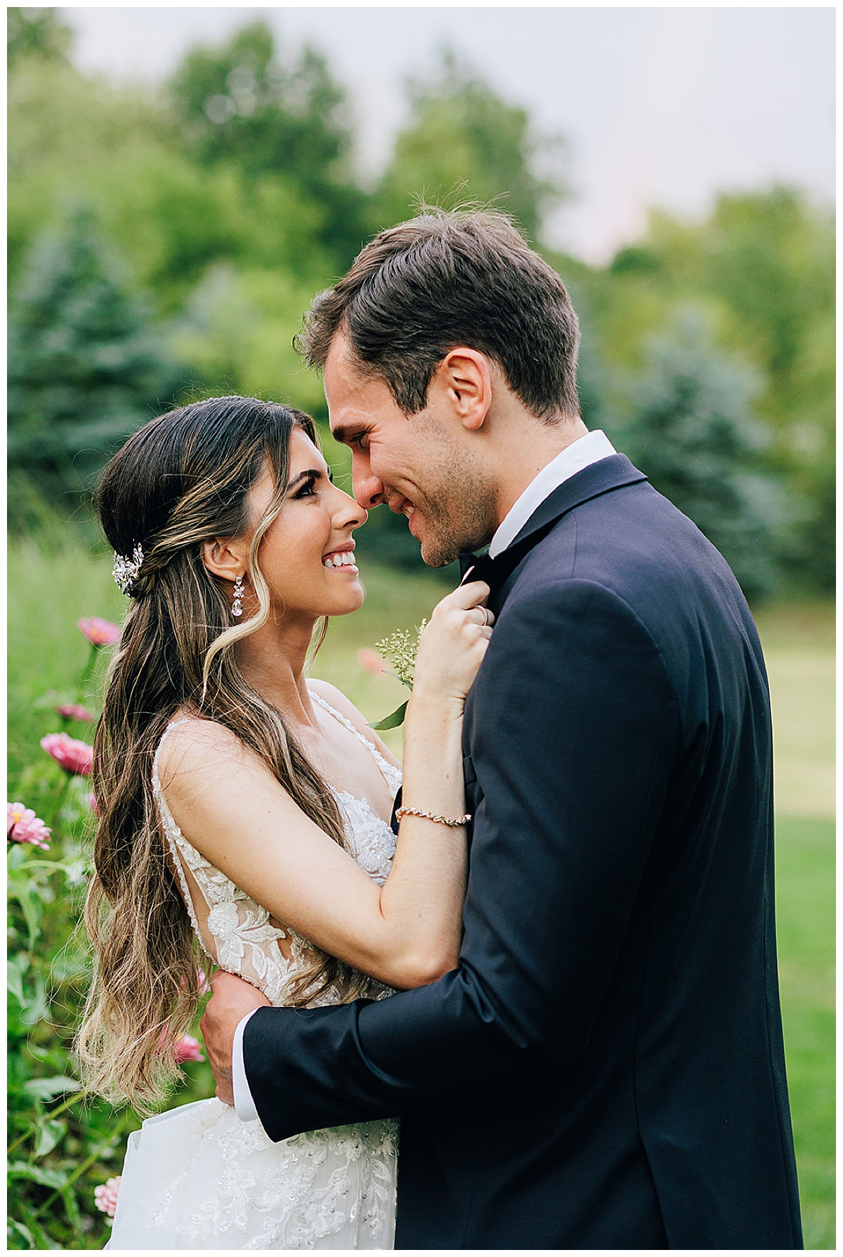 Wife pulls husband close for Detroit Wedding Photographer
