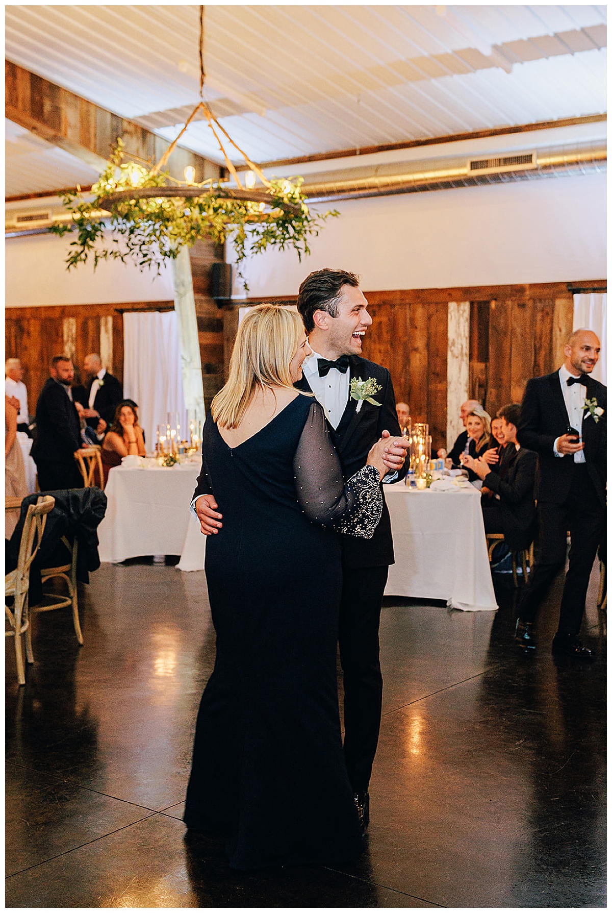 Mother and son dance together at Charming Michigan Wedding