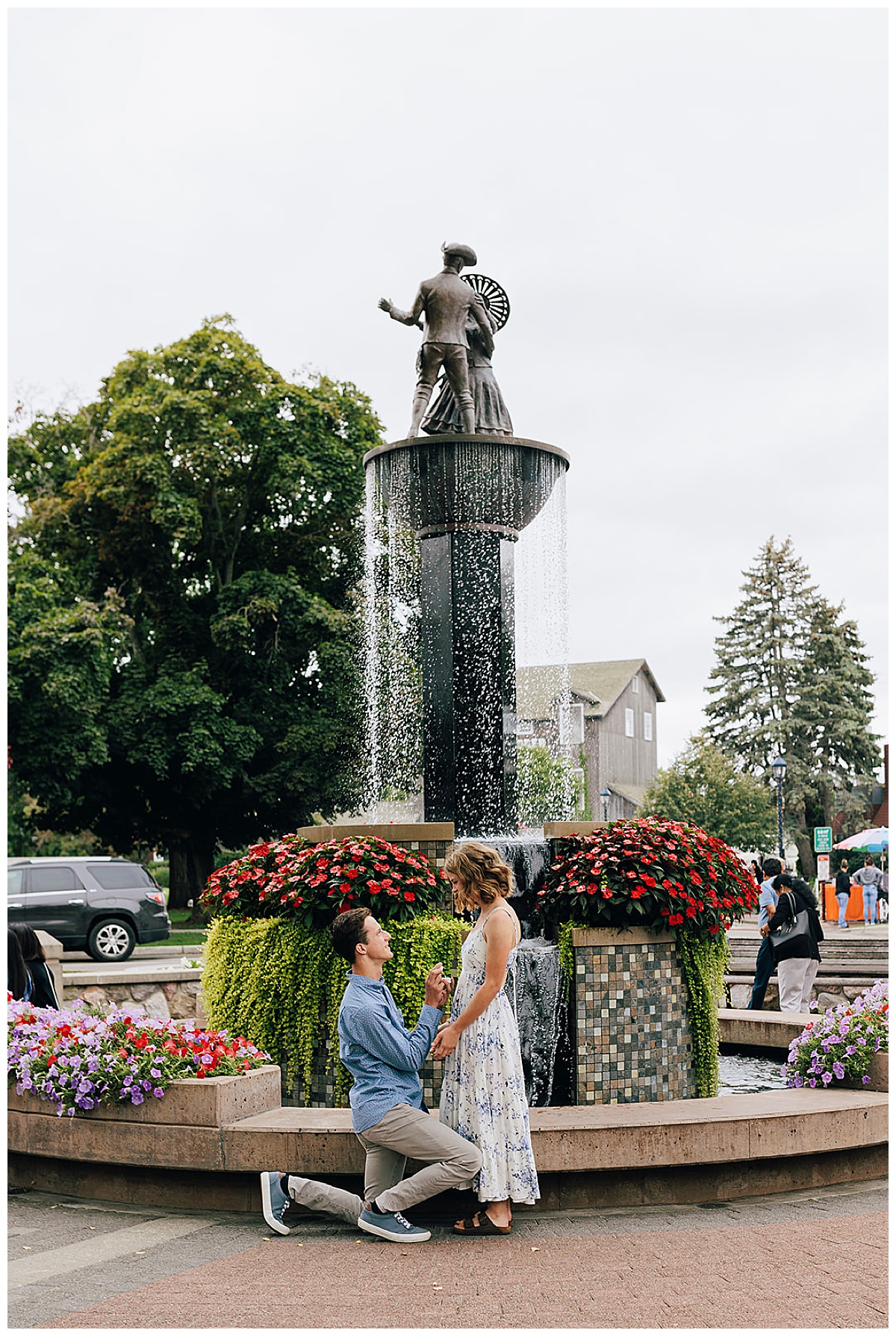 Couple getting engaged during Zehnder’s Fountain Proposal