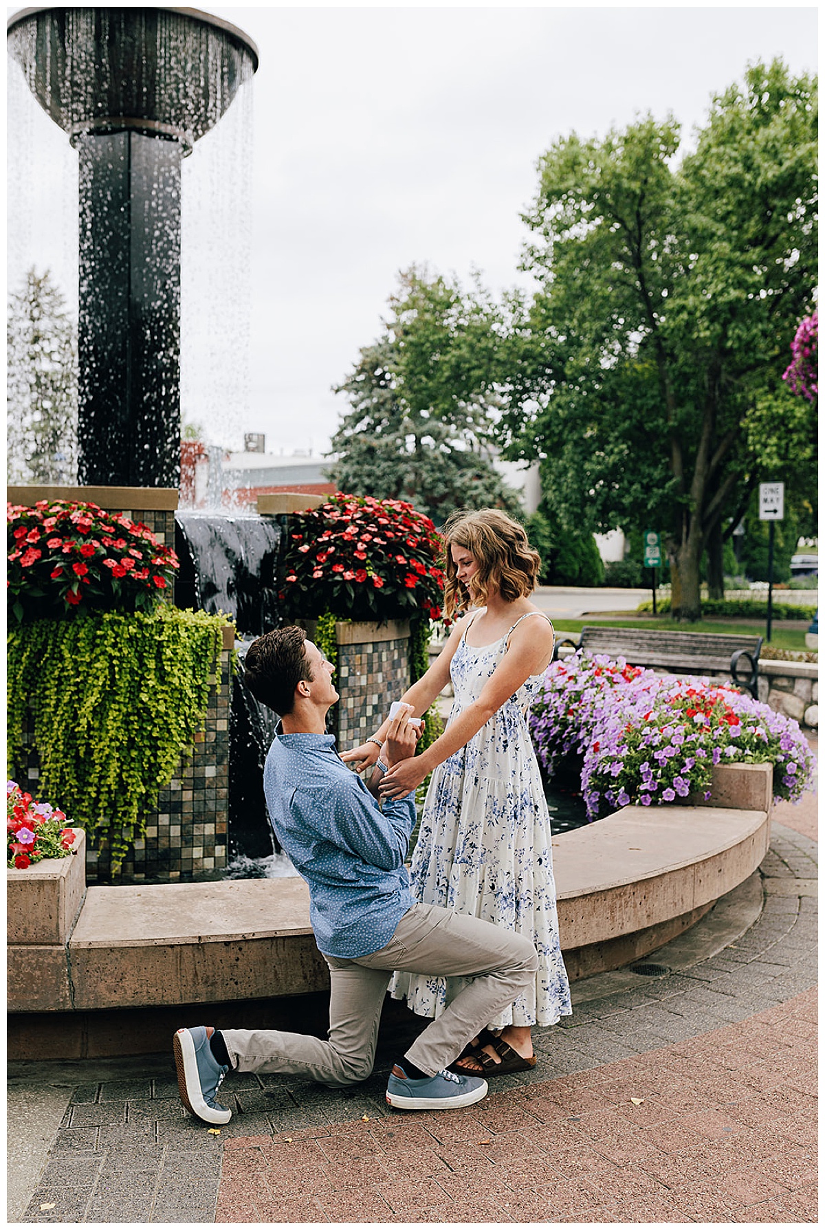 Man proposes to woman at Zehnder’s Fountain Proposal