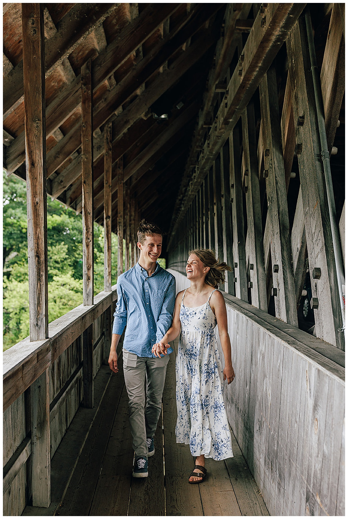 Couple walks and laughs together for Kayla Bouren Photography