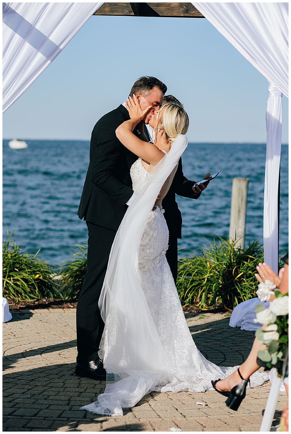 Bride and groom share first kiss for Detroit Wedding Photographer