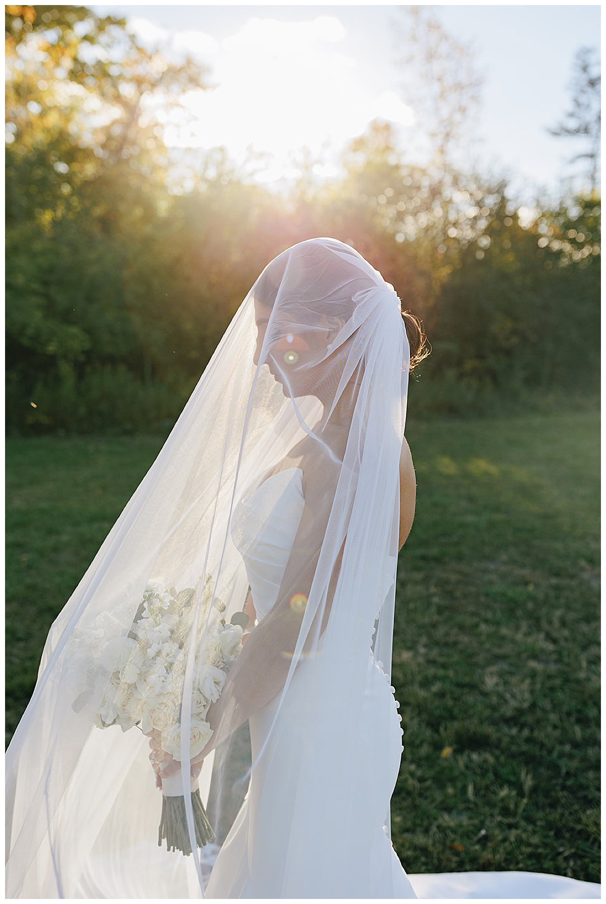Bride with veil over her for Detroit Wedding Photographer