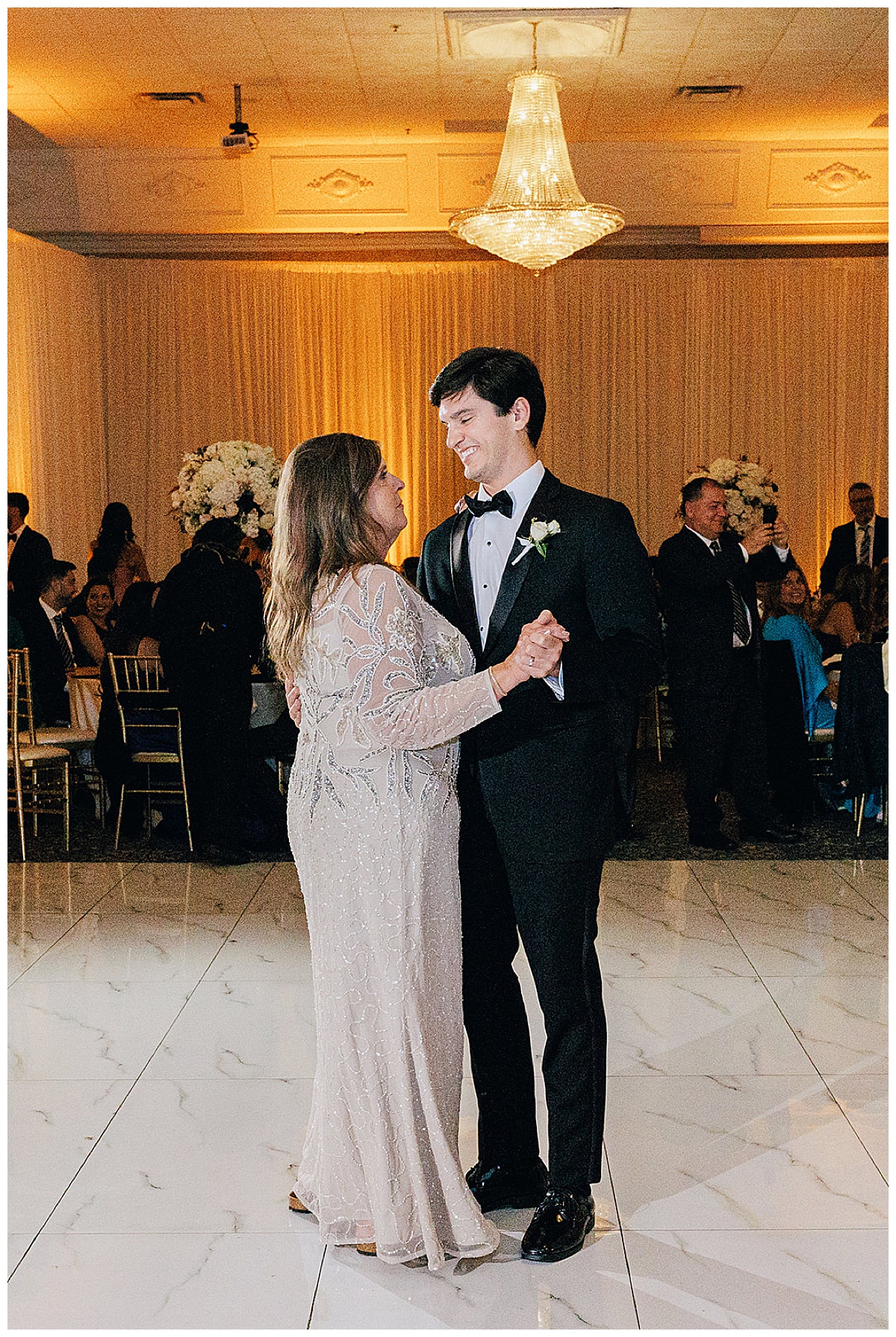 Mother and son dance together for Kayla Bouren Photography