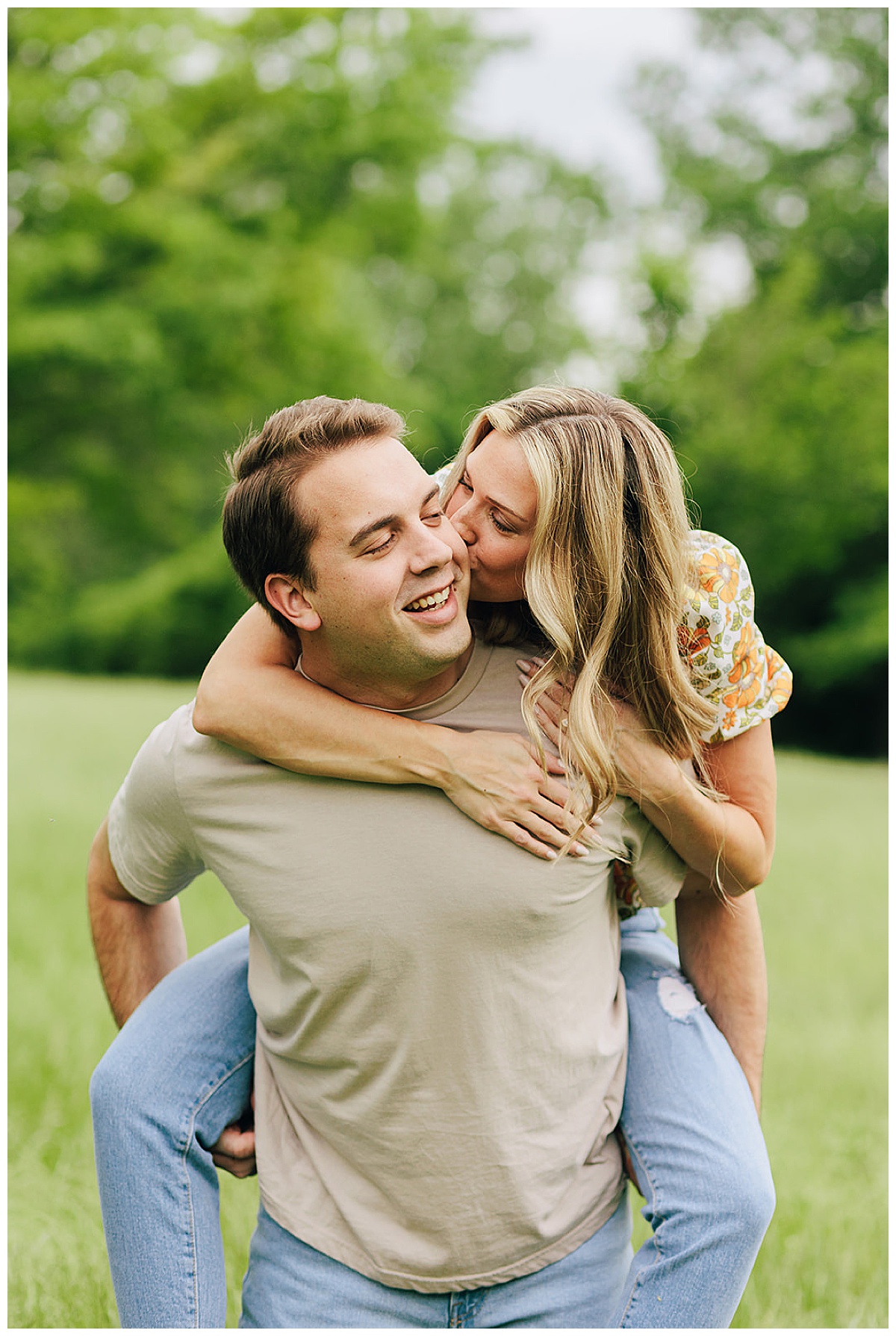 Fiance kisses man for Island Lake State Park Engagement Session