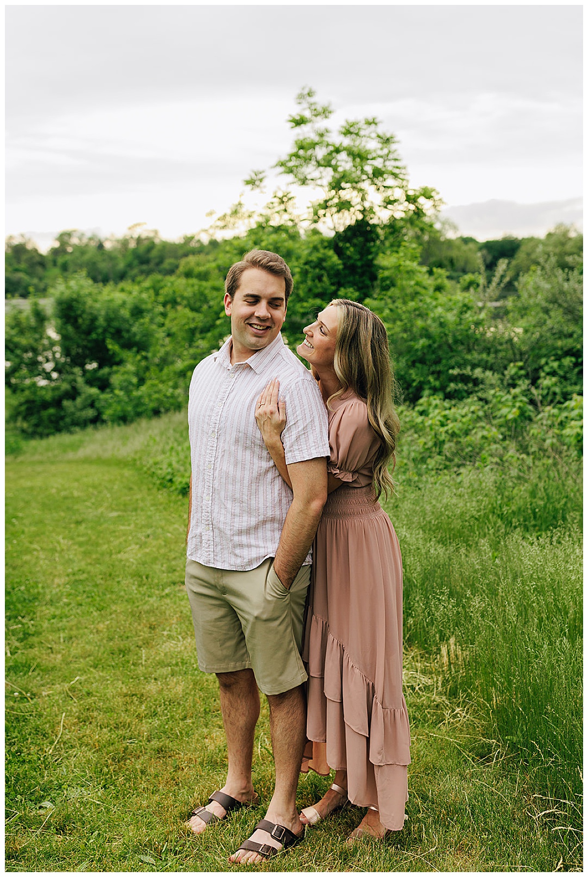 Man and lady smile together for Kayla Bouren Photography