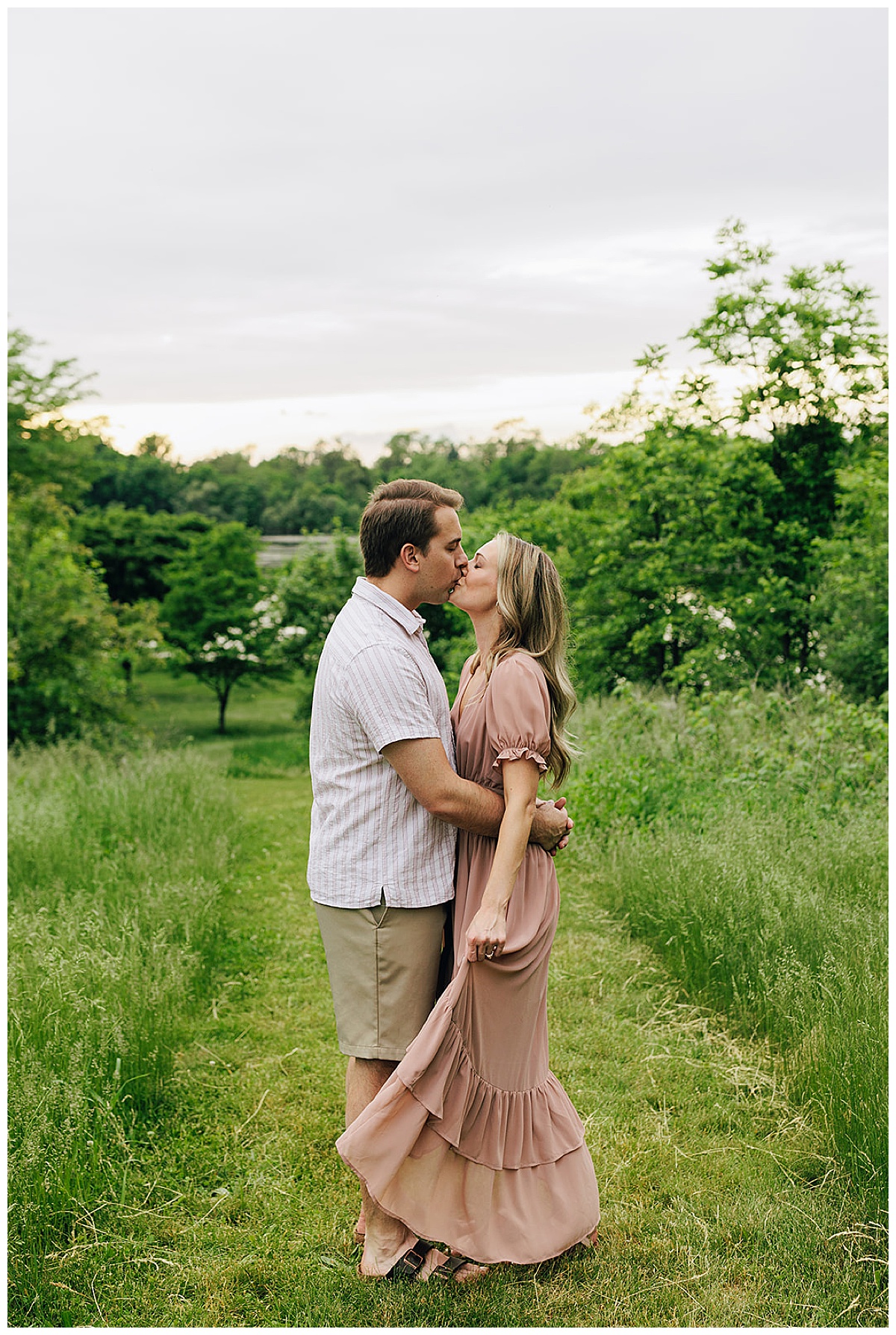 Engaged couple kiss during Island Lake State Park Engagement Session