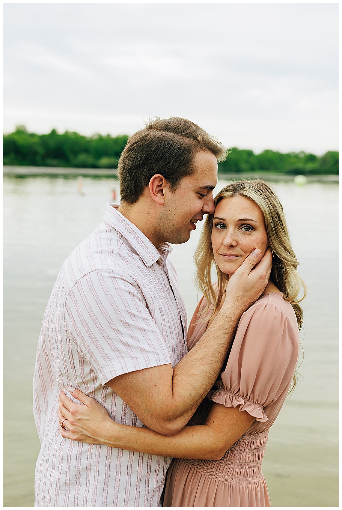 Couple hold one another for Island Lake State Park Engagement Session