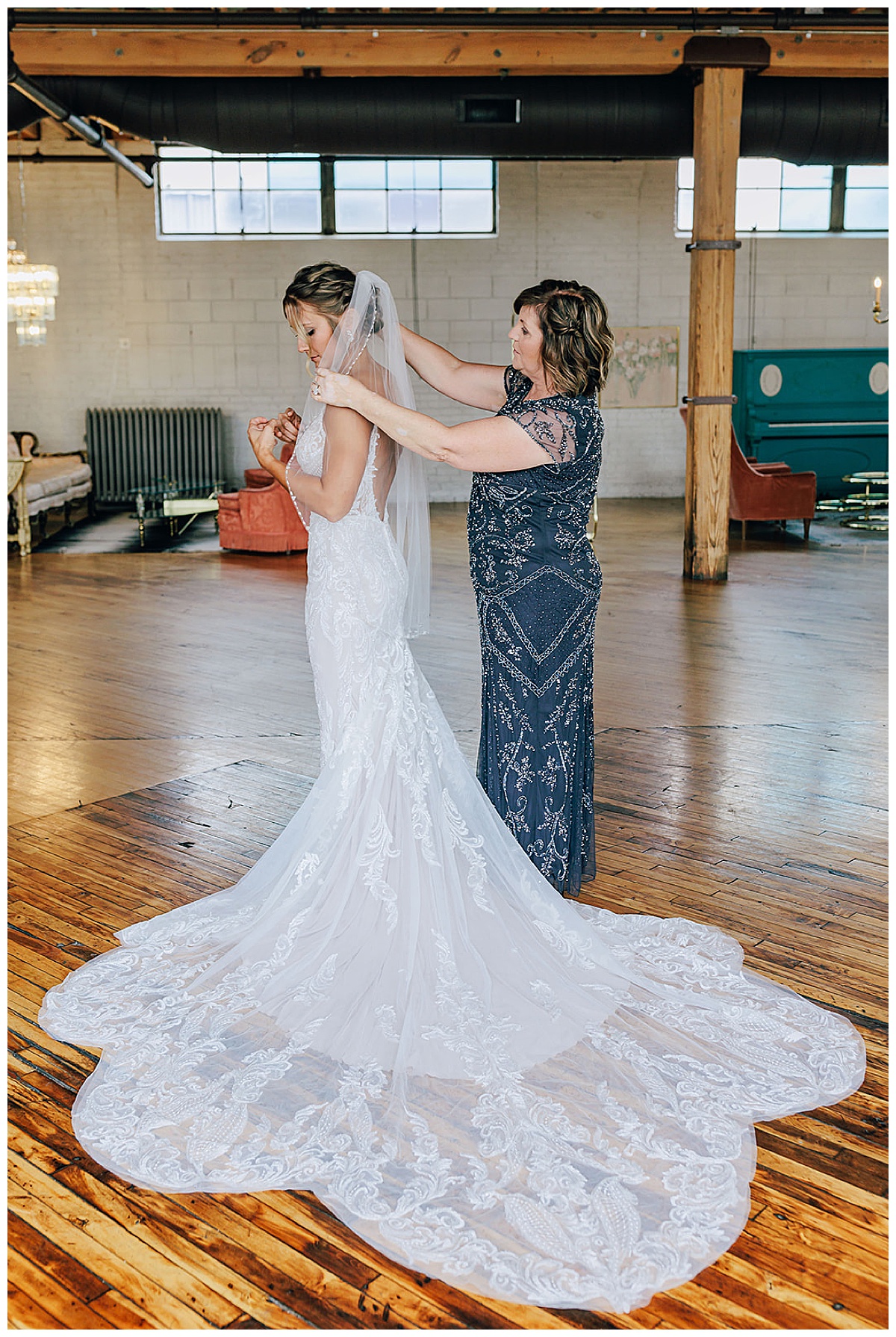 Mom helps bride with veil for Detroit Wedding Photographer