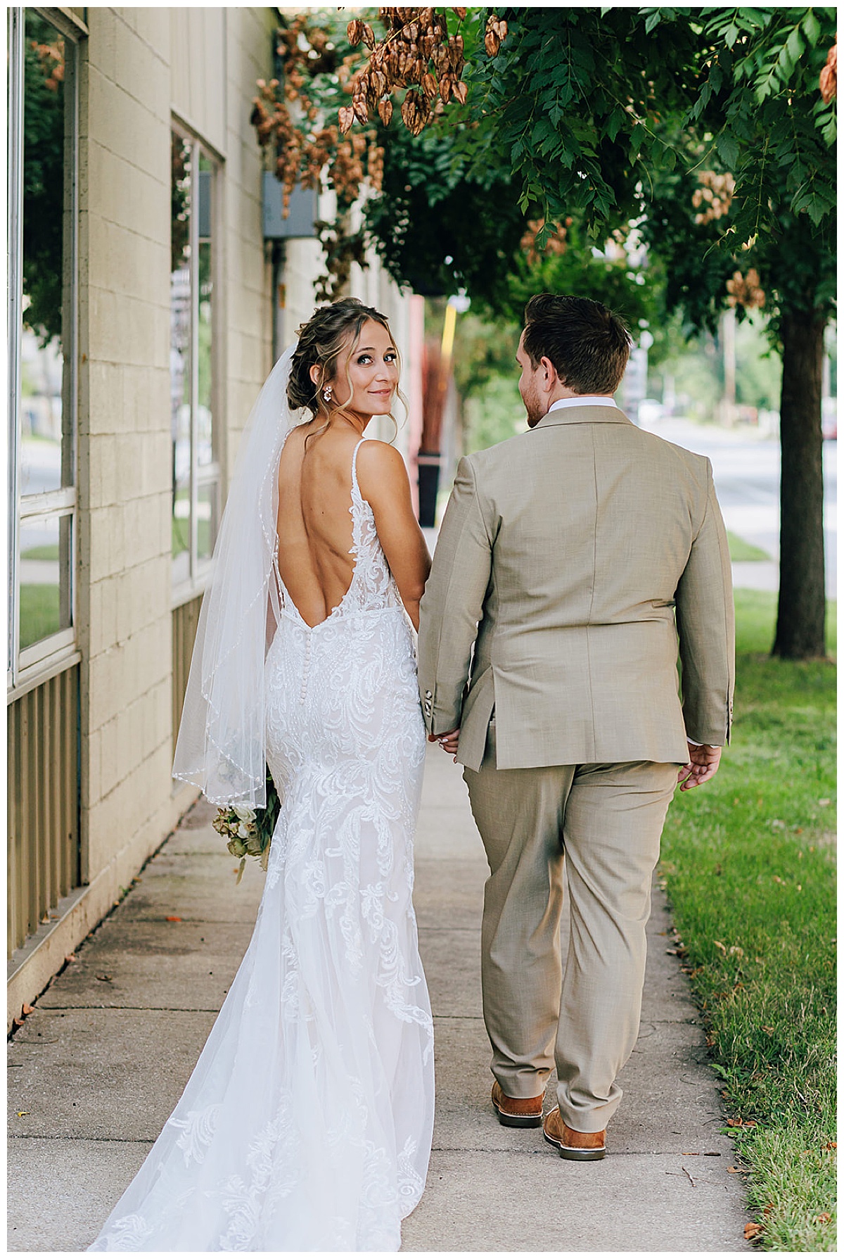 Married couple walk together for Kayla Bouren Photography