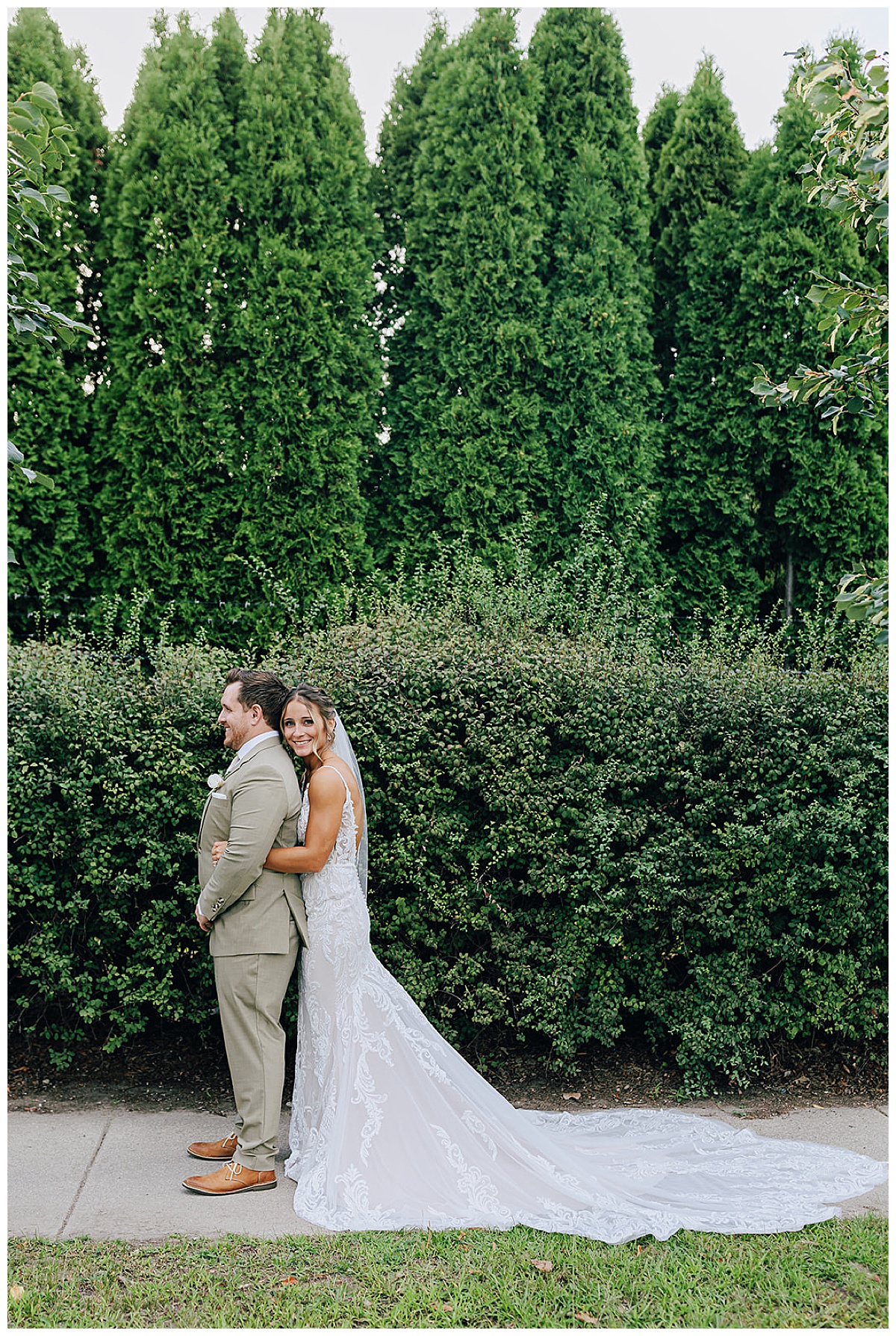 Bride hugs groom for Kayla Bouren Photography