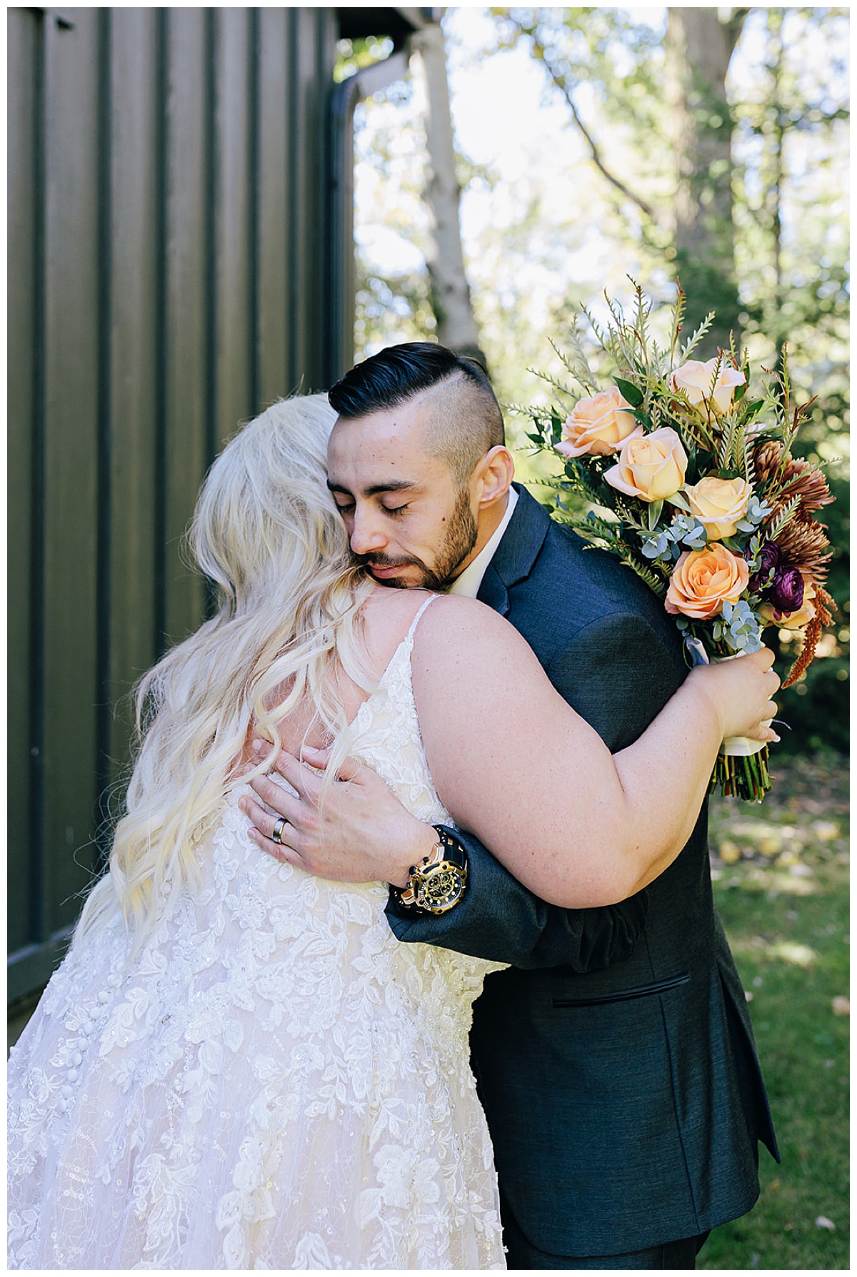 Man and woman hug each other for Kayla Bouren Photography