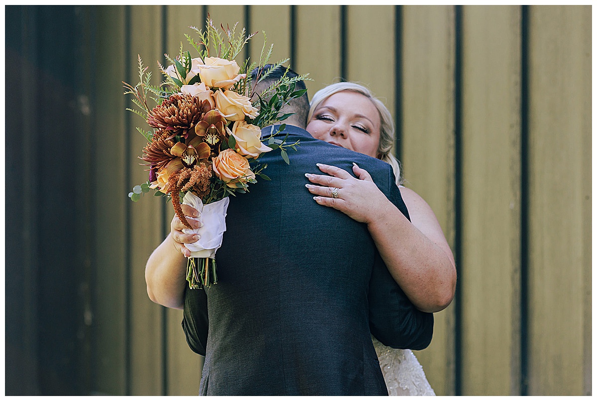 Two people embrace in a hug for Detroit Wedding Photographer