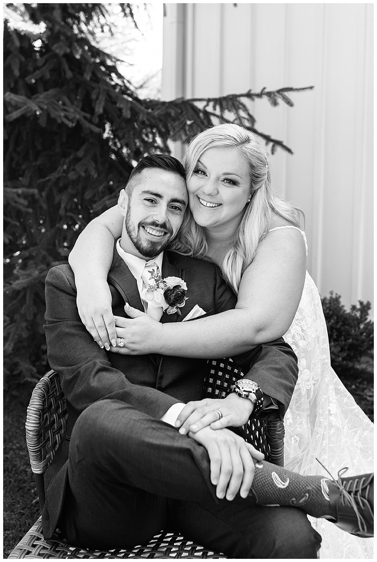 Husband and wife hug each other at Holly Township Wedding