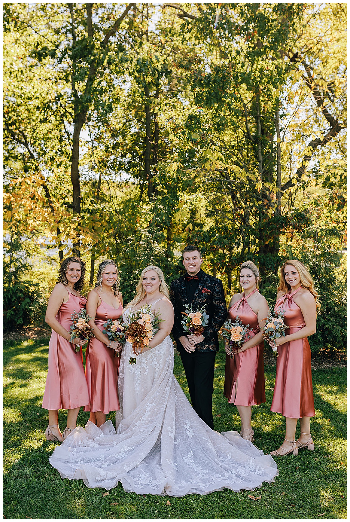 Bride with bridal party at Holly Township Wedding