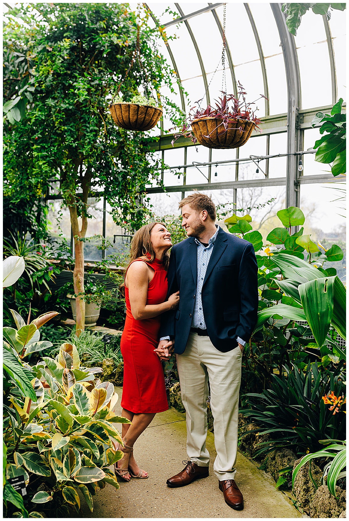 Guy looks at lady at Anna Scripps Whitcomb Conservatory