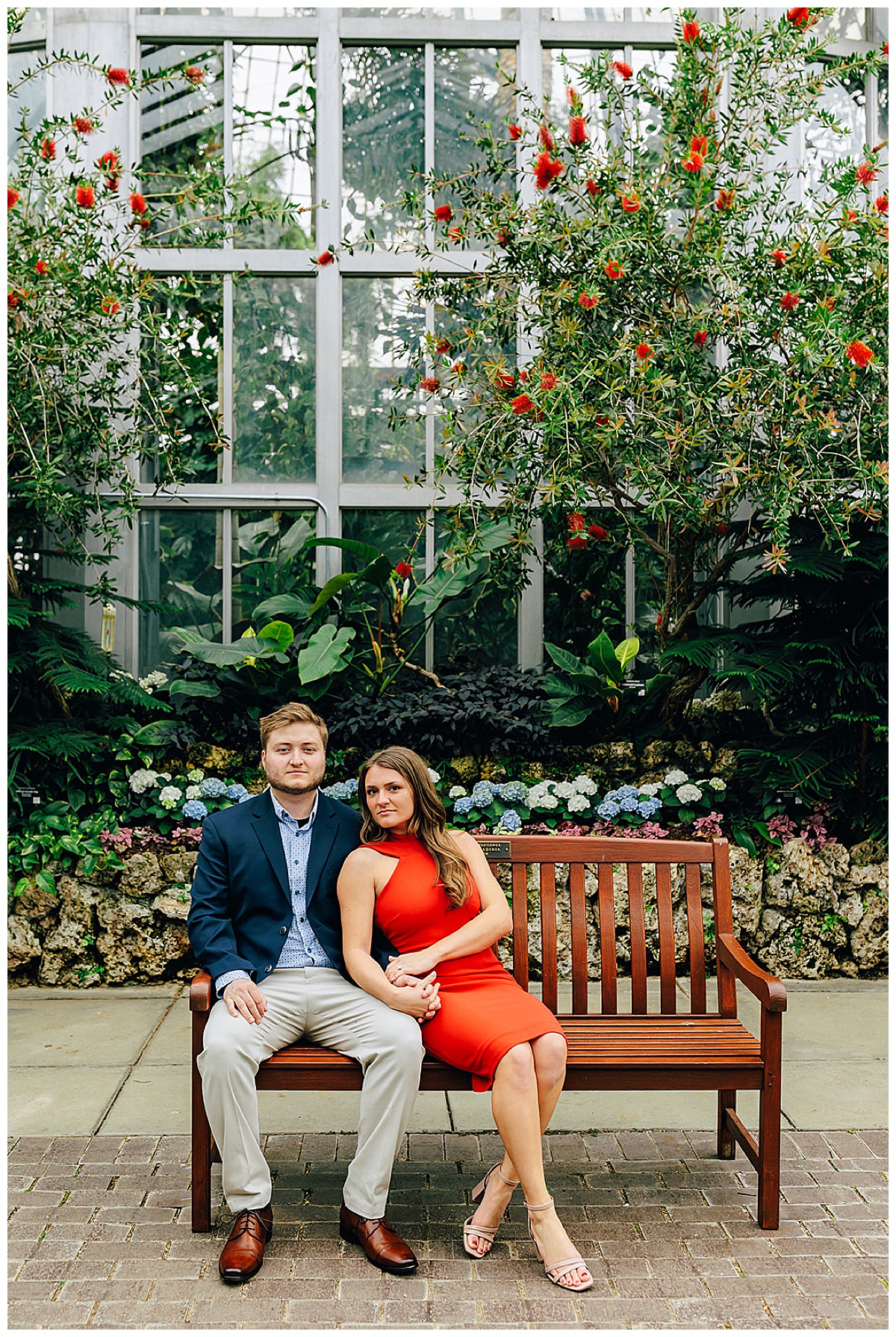 Fiances sit together on bench for Detroit Wedding Photographer
