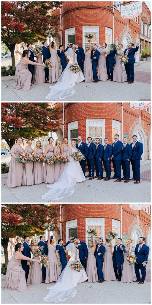 Wedding party surrounds couple with love and laughter for Kayla Bouren Photography